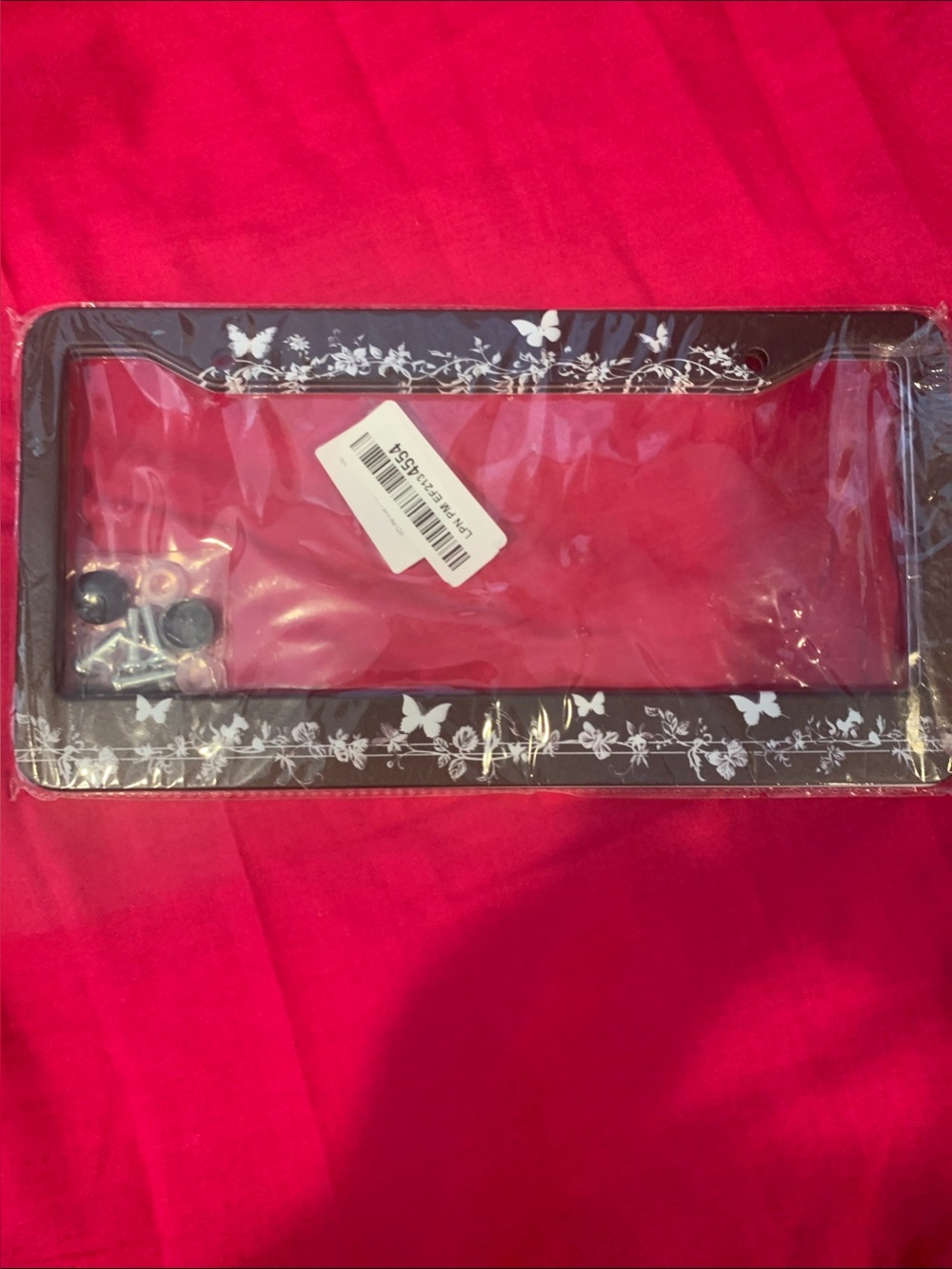 Black License Plate Frame with White Butterfly Vine Accents